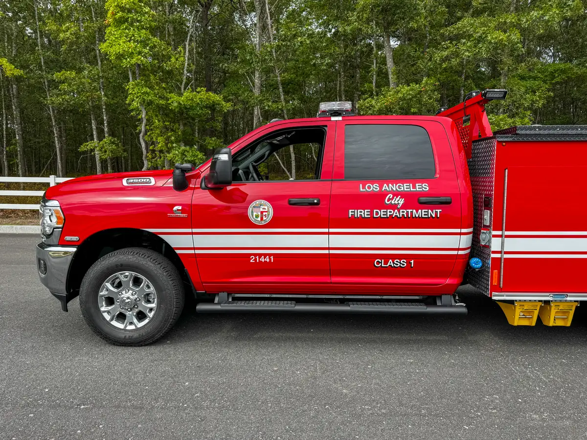 Driver-side profile of cab and front utility body.