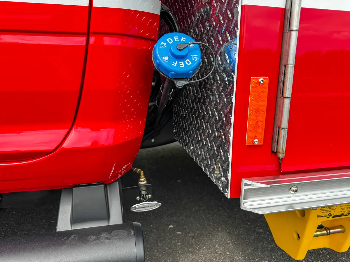 Blue side inlet connector and step area near cab.