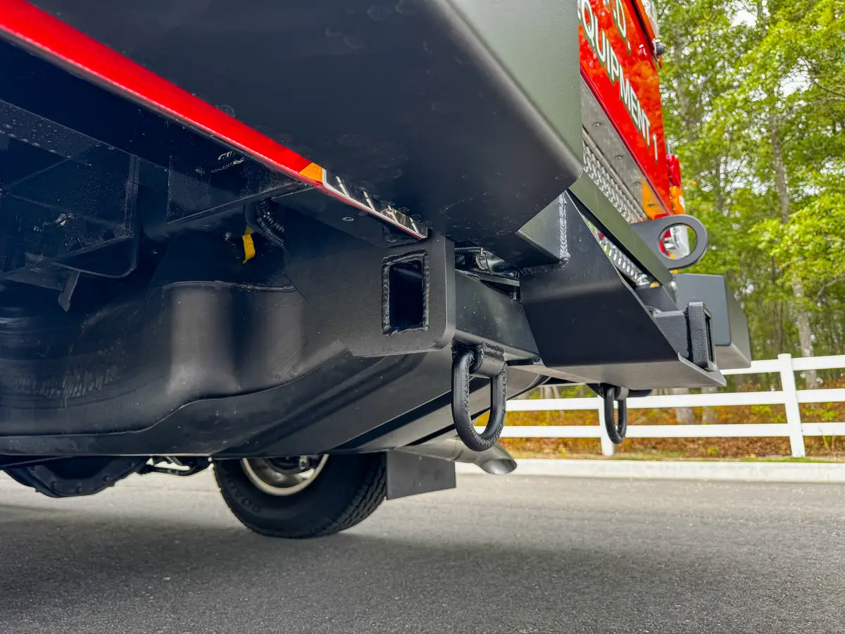 Underside rear bumper hardware and tow ring close-up.