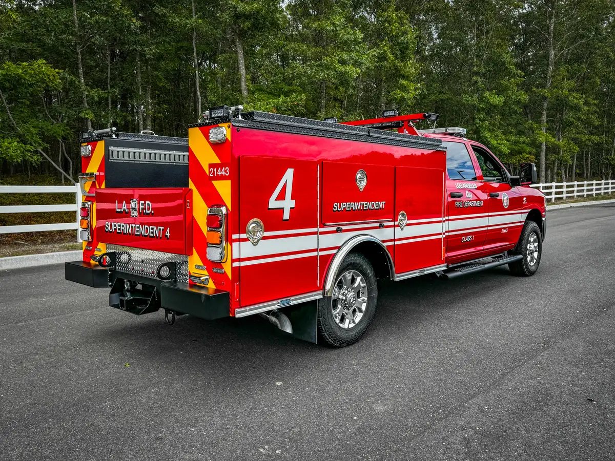 Rear passenger-side three-quarter view with chevron rear panel.