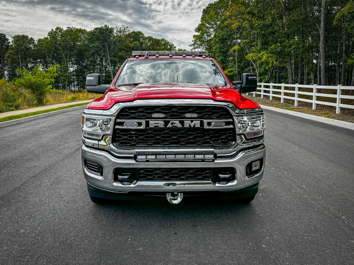 Head-on front view with RAM grille and bumper.
