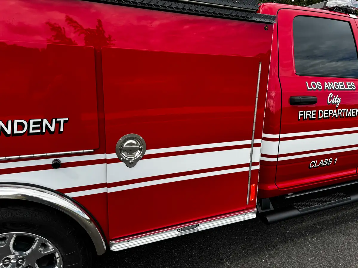 Side compartment close-up with exterior panel and latches.