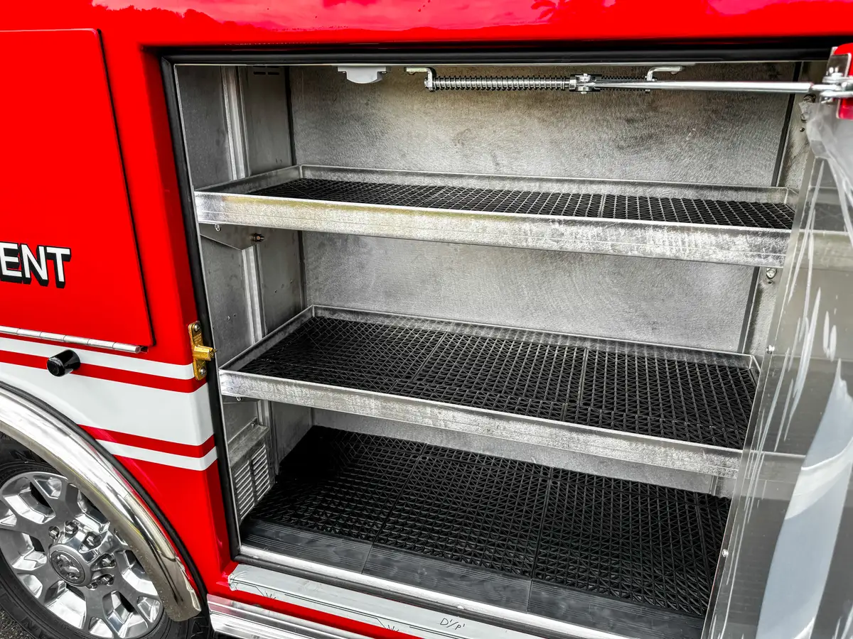 Compartment interior close-up showing stacked shelf layout.