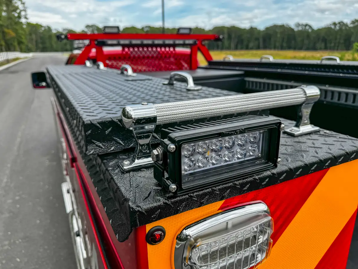 Top rear rack area with mounted light and hardware.