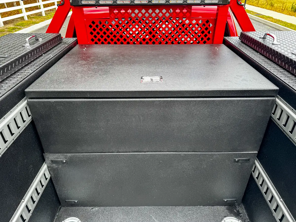Front bed storage box viewed from inside cargo area.