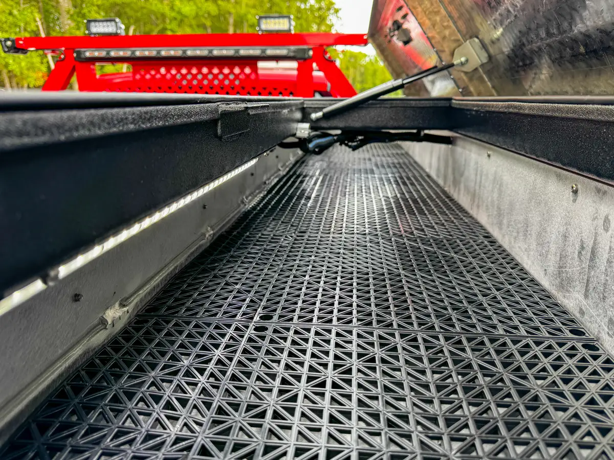 Long bed channel view with anti-slip grated floor.