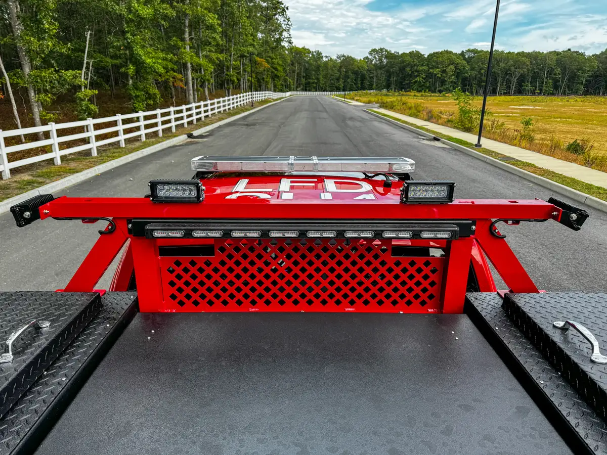 Rear bed view toward front rack and light bar.
