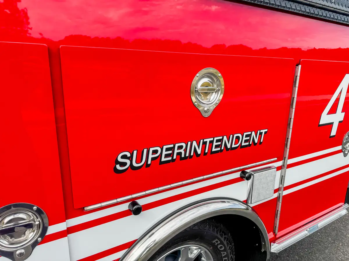 Side body panel close-up with LAFD seal and lettering.