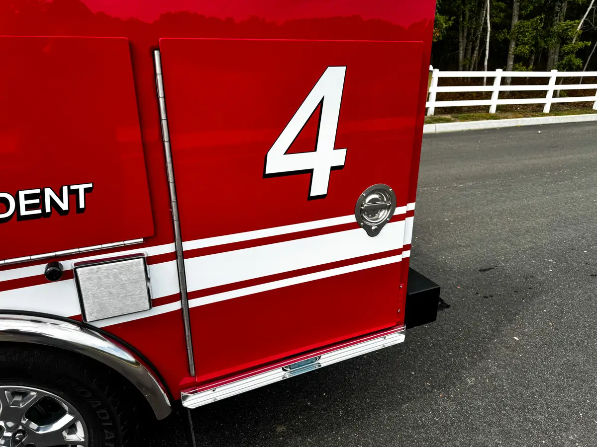 Rear side body close-up with unit number 4.