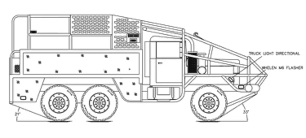 Exterior view of small fire truck showing cab, body compartments, and wheel/tire area.