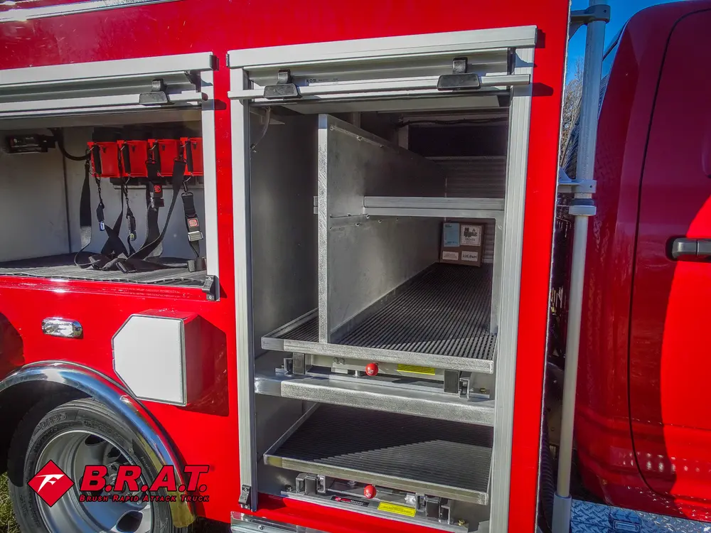 Open side compartment with upper shelf and empty storage.