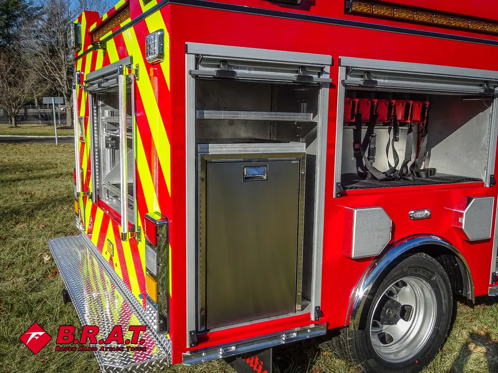 Rear-side compartment section with multiple doors open and shelves visible.