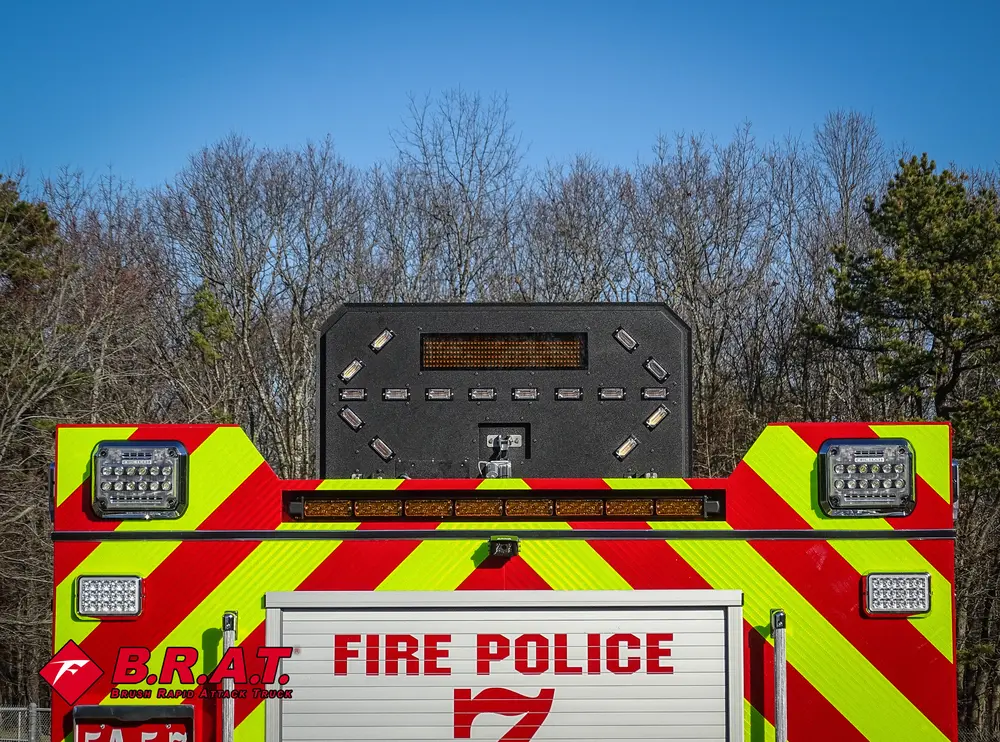 Rear panel close-up with electronic message board and warning lights.