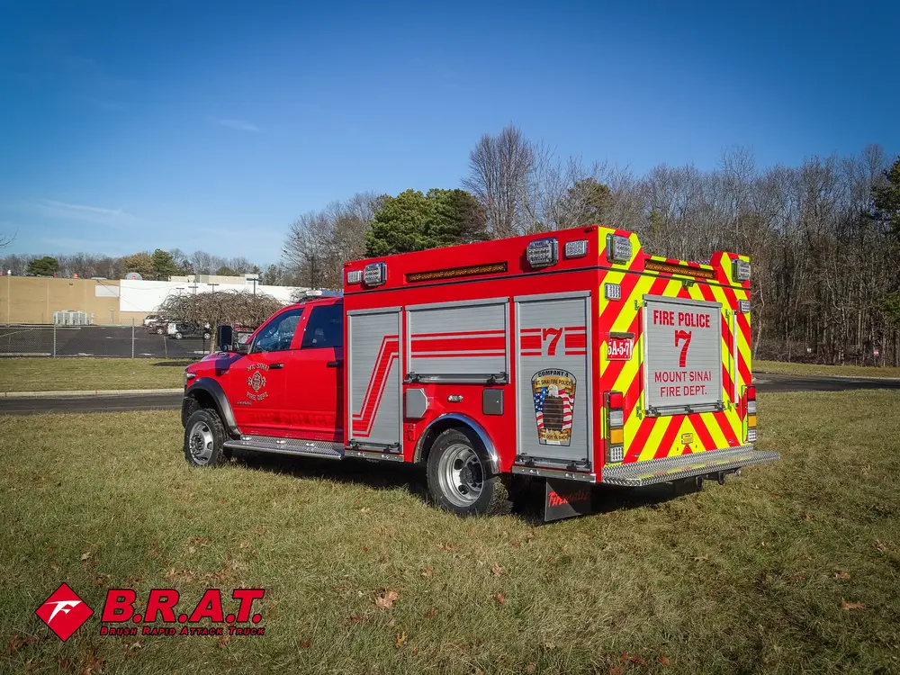 Rear-left three-quarter view with chevron rear panel visible.
