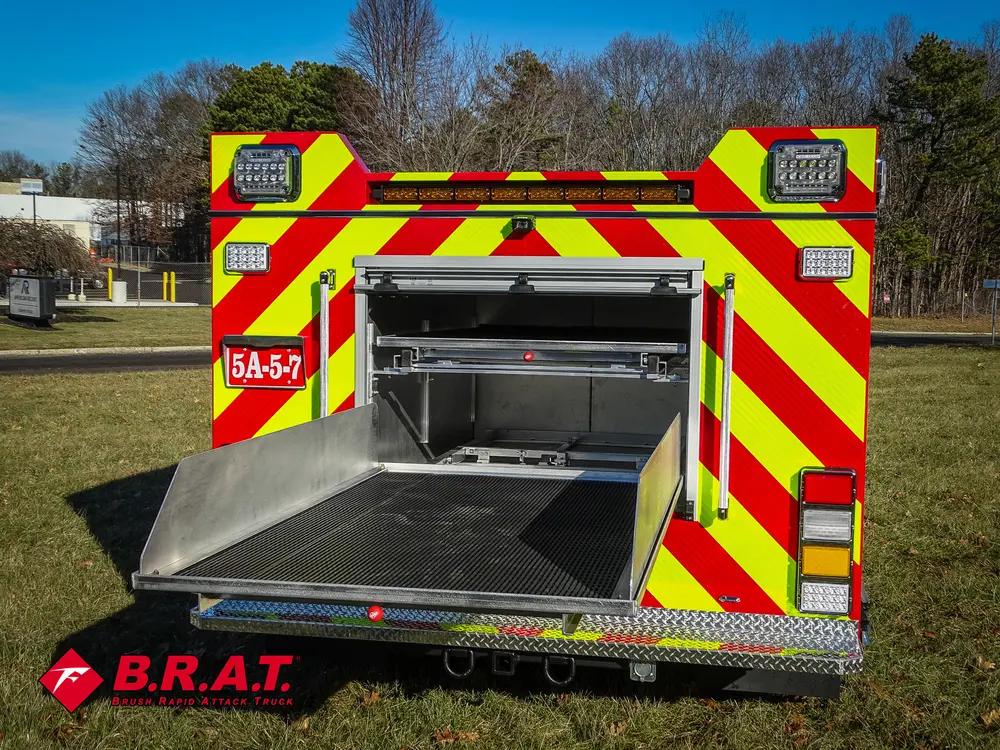 Rear center bay with fold-down tray extended and chevrons framing.