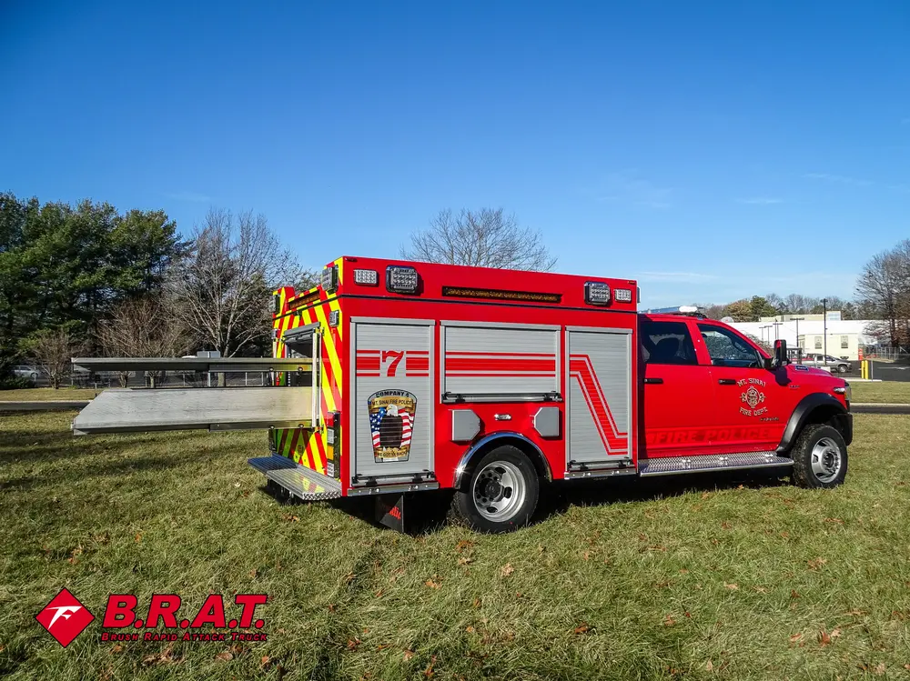 Rear-right three-quarter view with fold-out rear tray visible.