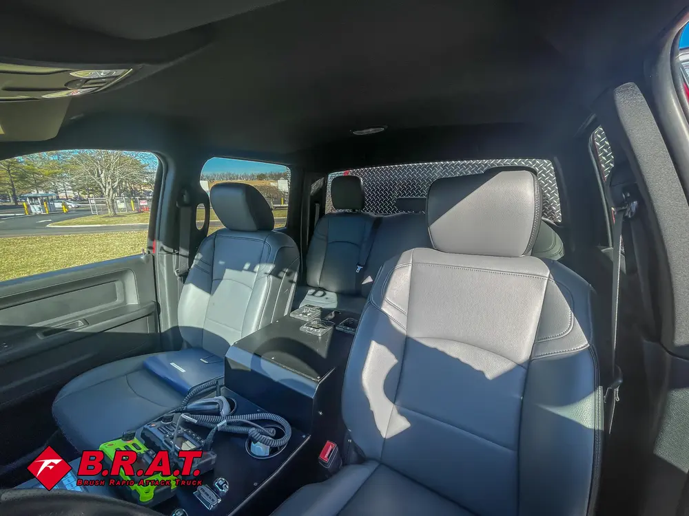 Front seats and center console view from passenger side.