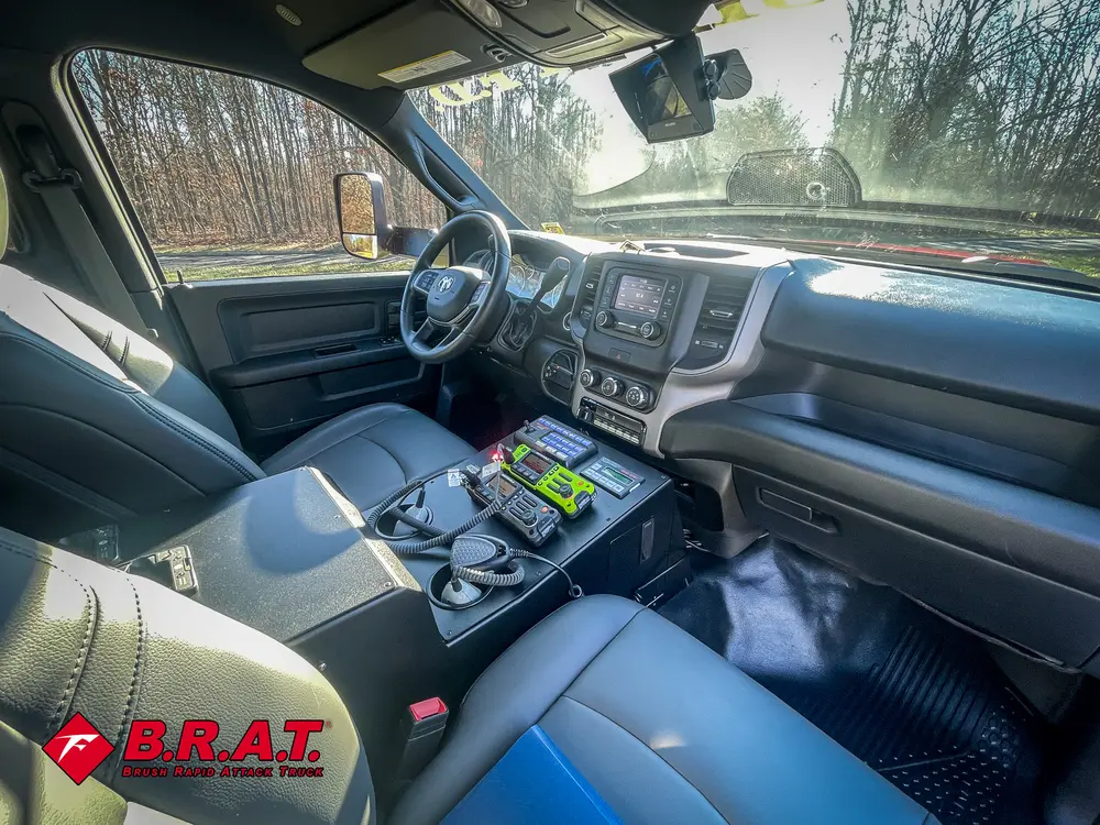 Passenger-side front interior with dashboard and mounted controls.