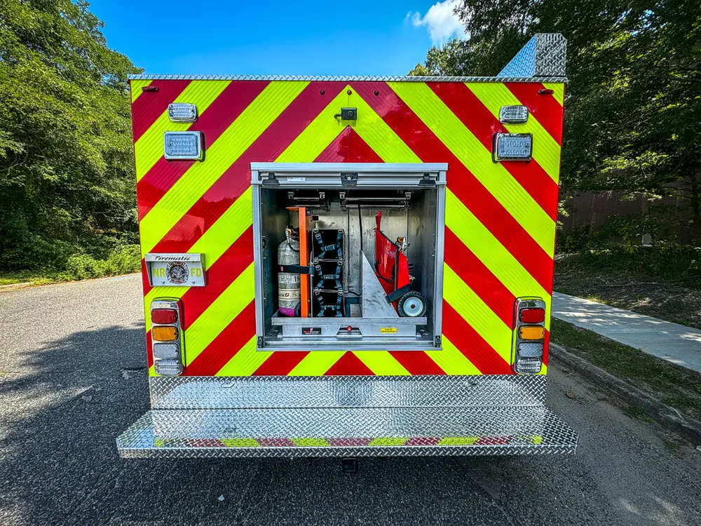 Straight rear view with center compartment open in chevron panel.