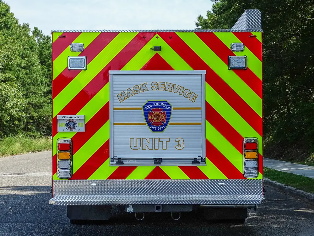 Straight rear view with chevron striping and center rear panel.