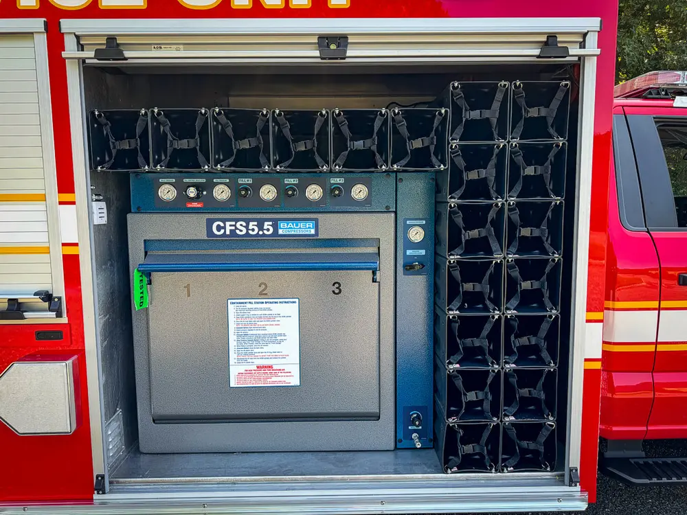 Side equipment panel with CFS5.5 module and SCBA bottle rack.
