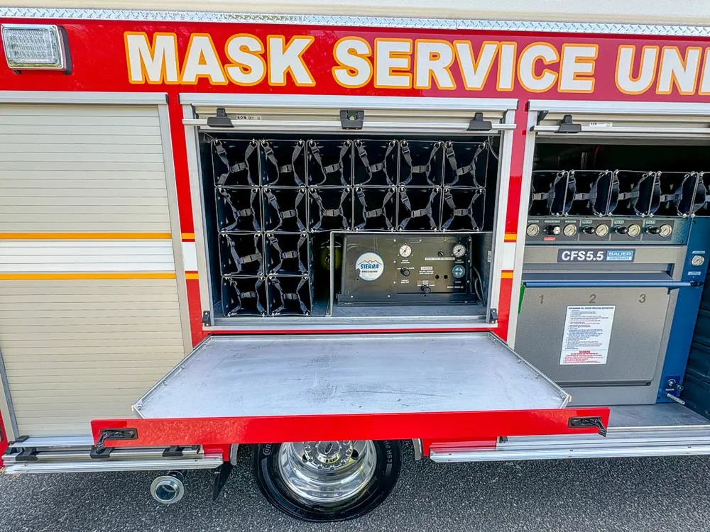 Long side compartment open showing CFS5.5 controls and bottle storage.