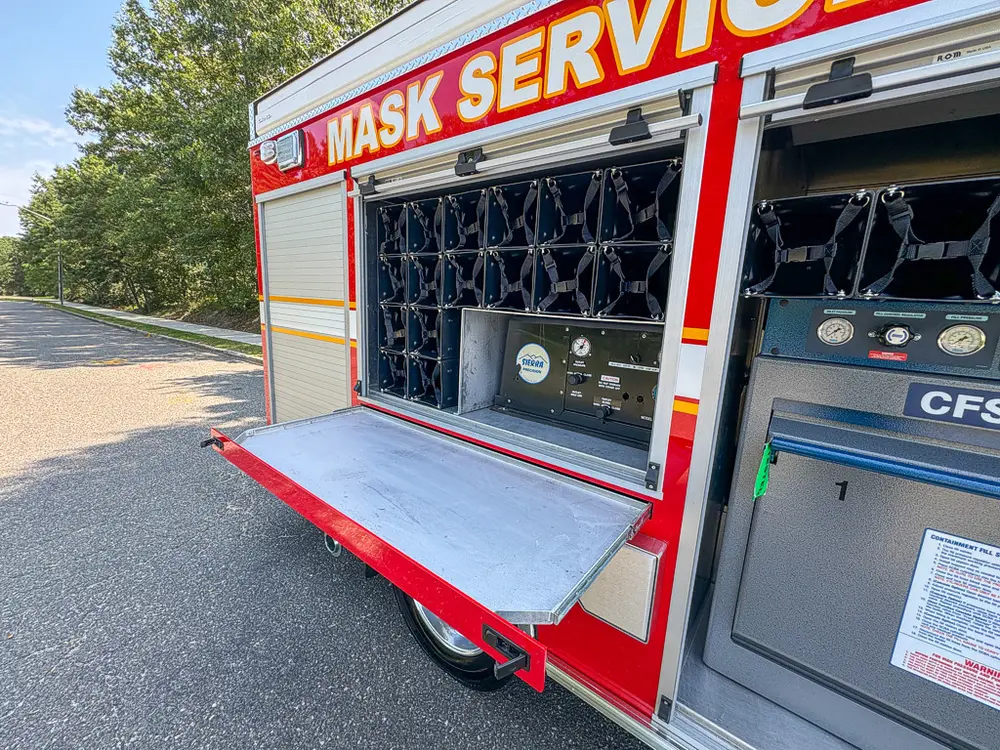 Long side compartment open with CFS5.5 panel and bottle rack visible.