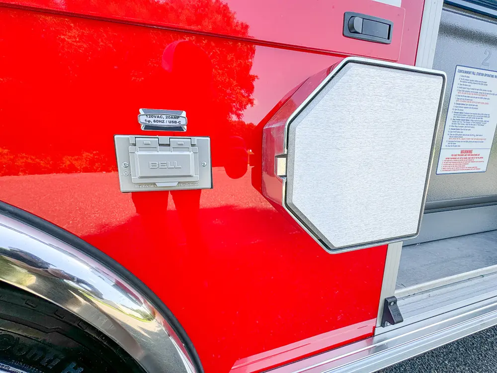 Side body close-up with small access panel and octagonal hatch closed.