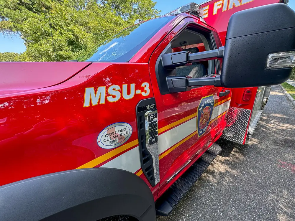 Door graphic close-up with white MSU-3 lettering on red panel.