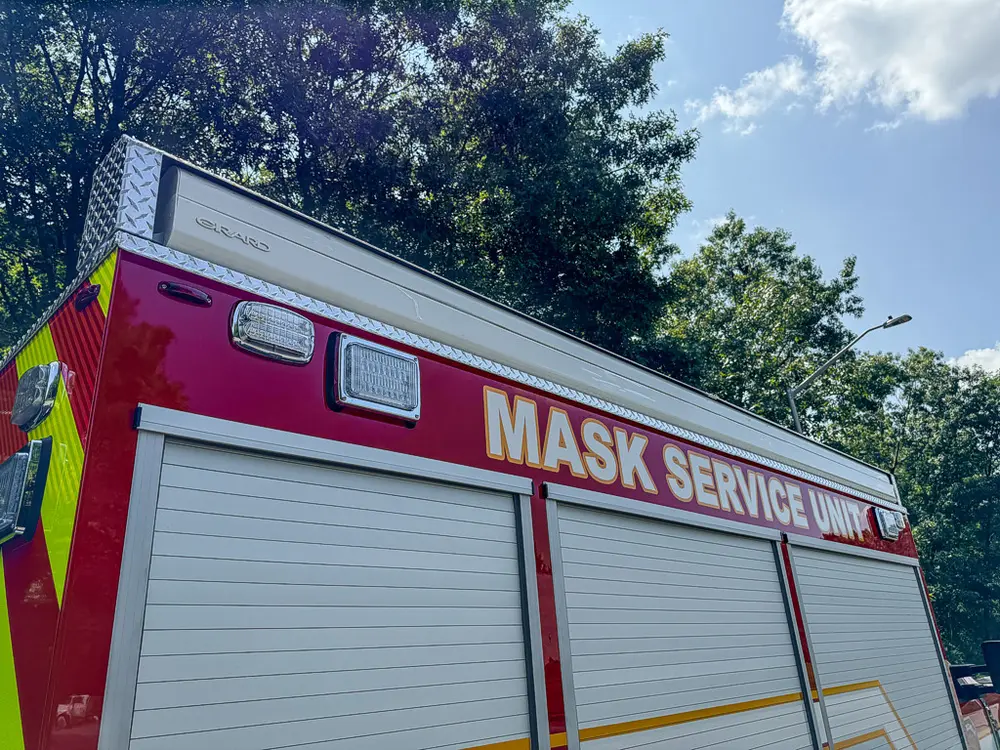 Right-side upper body view with Mask Service Unit lettering.