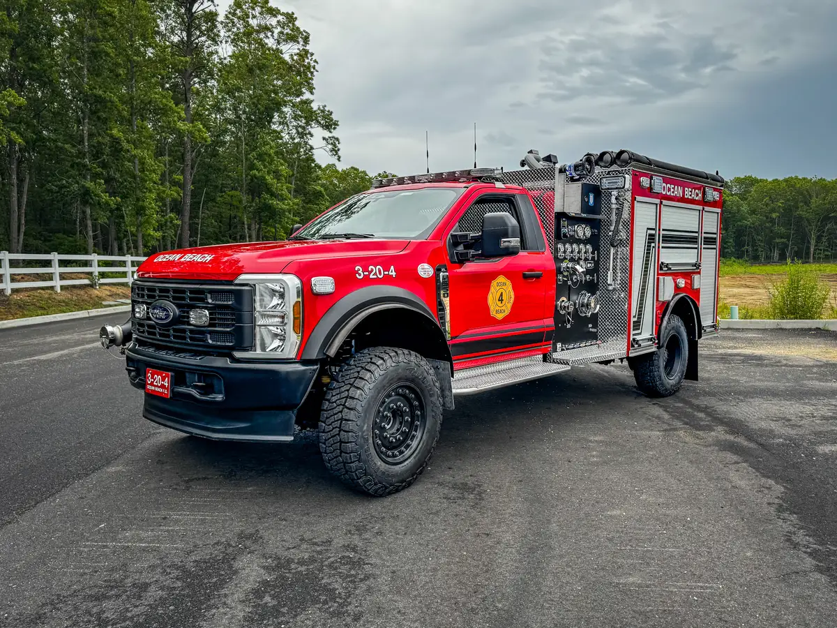 Rear-right exterior view of red brush truck, photo 4 of 179.