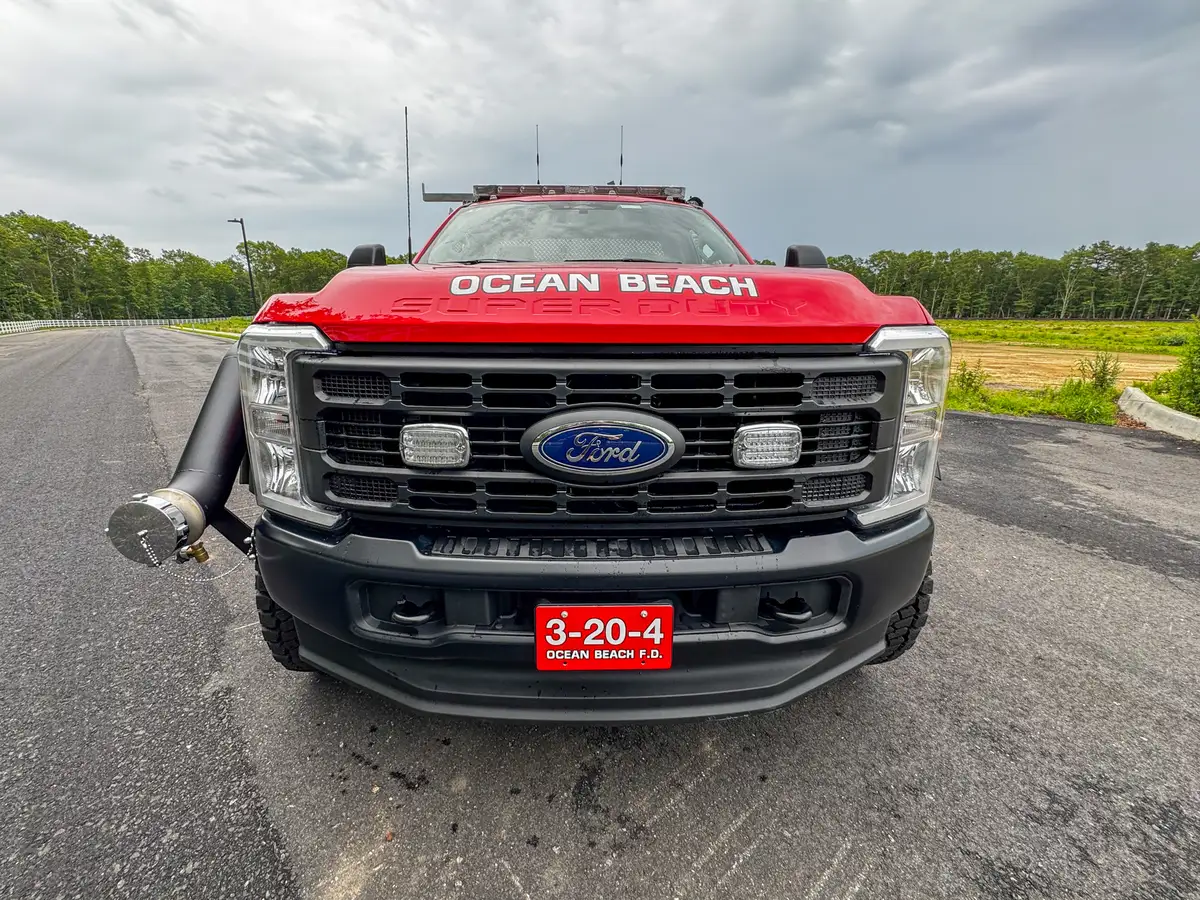 Red brush truck front-left exterior view, photo 11 of 179.