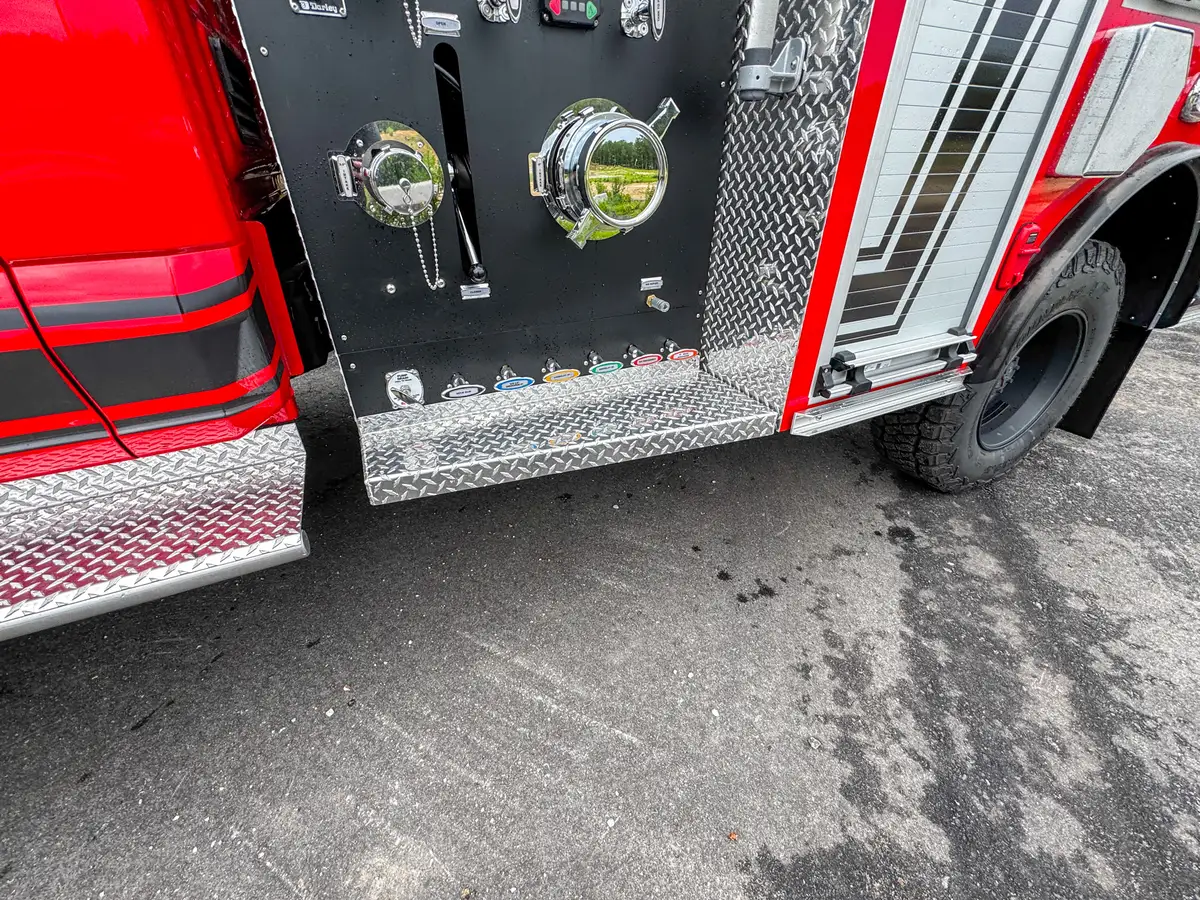 Rear chevron and taillight detail on brush truck, photo 17 of 179.