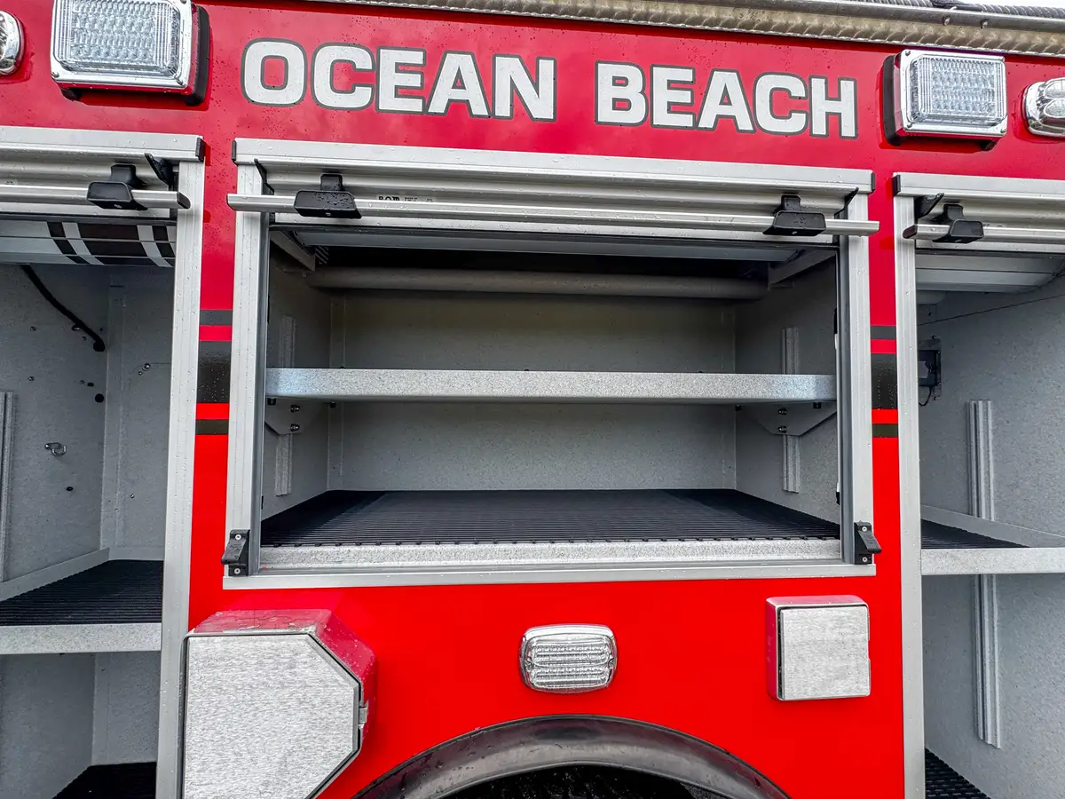 Head-on front view of red brush truck, photo 22 of 179.