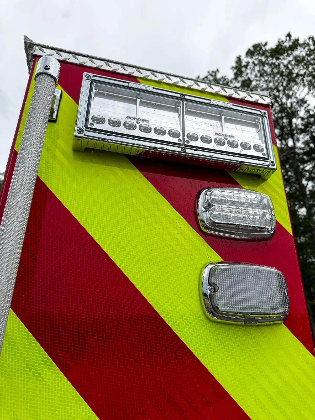 Head-on front view of red brush truck, photo 32 of 179.