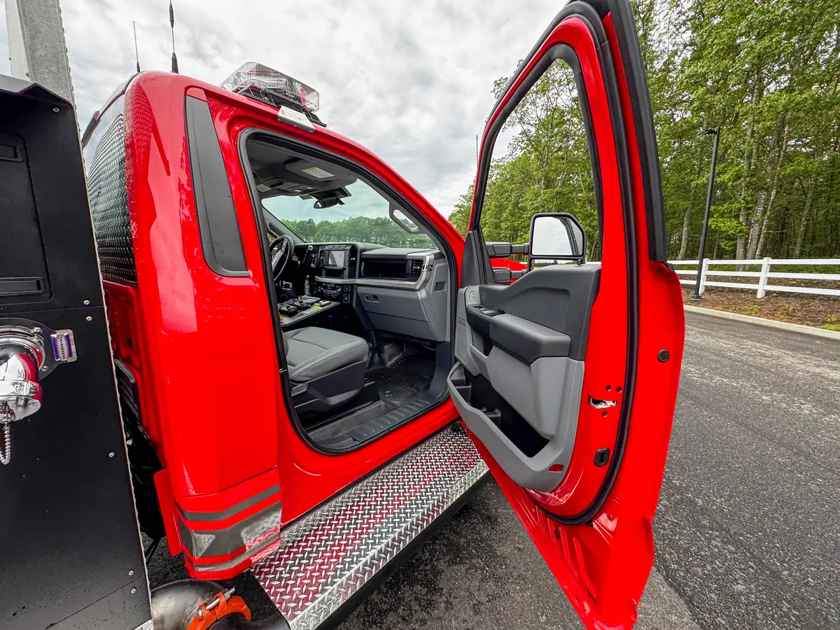 Rear chevron and taillight detail on brush truck, photo 57 of 179.
