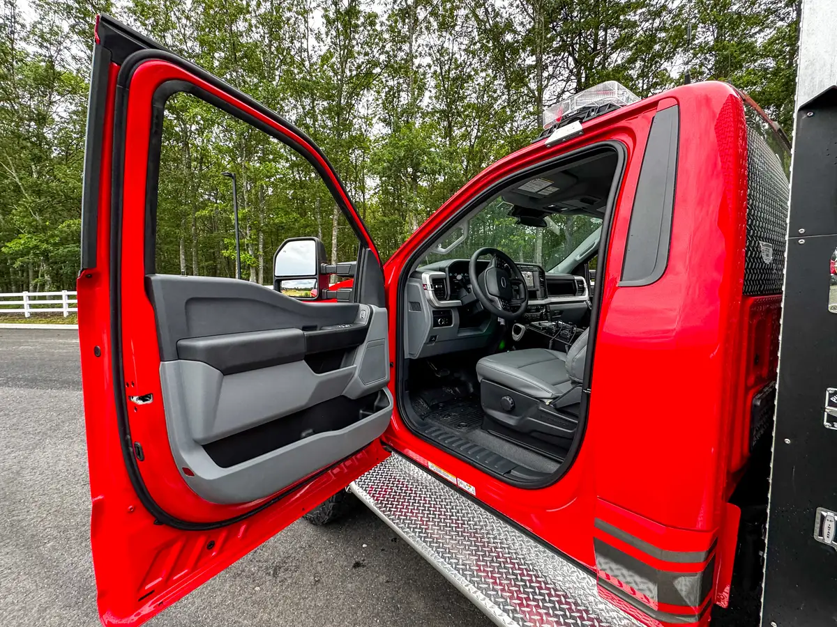 Wheel and tire detail on brush truck, photo 60 of 179.