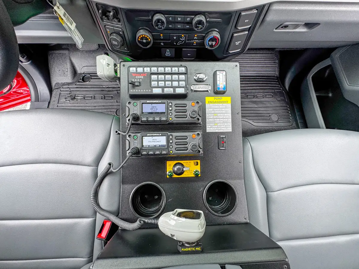 Rear-right exterior view of red brush truck, photo 64 of 179.