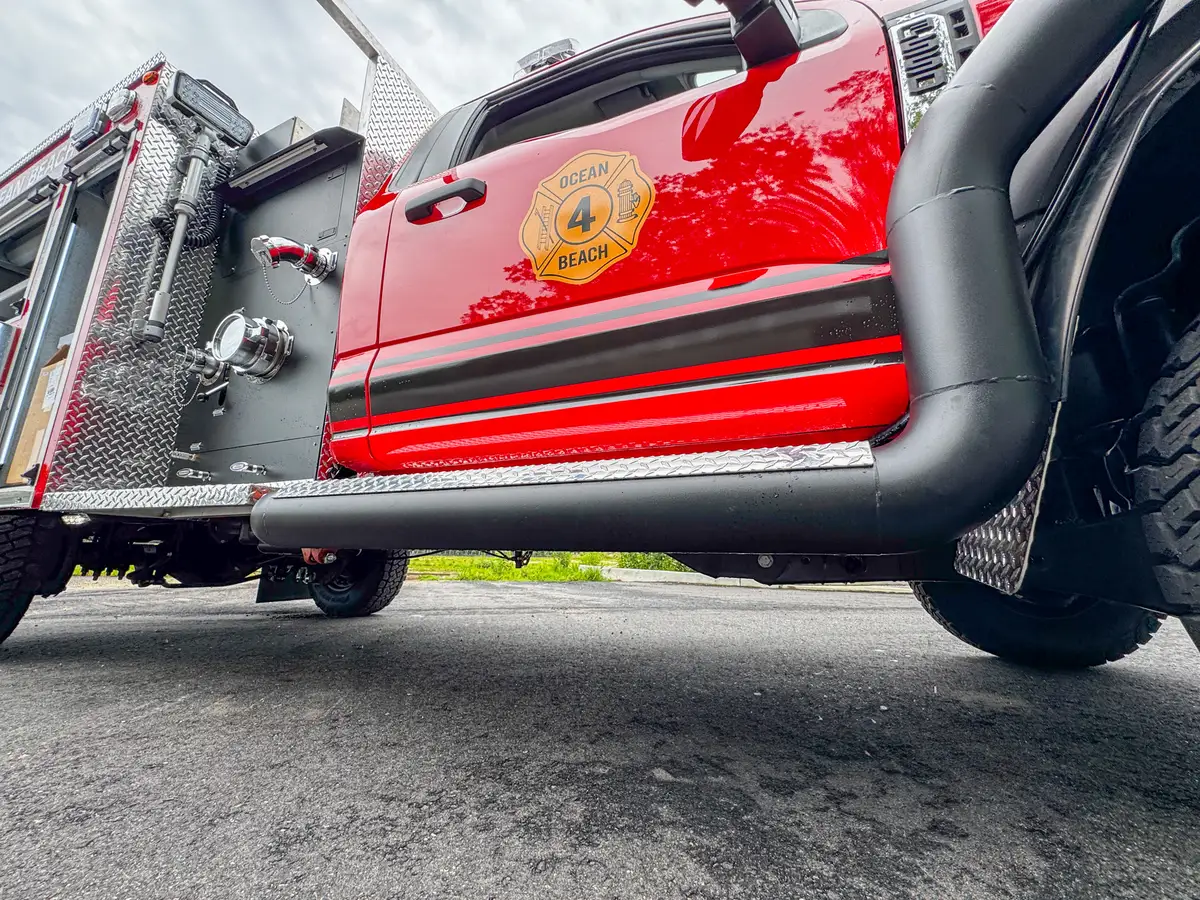 Rear chevron and taillight detail on brush truck, photo 67 of 179.