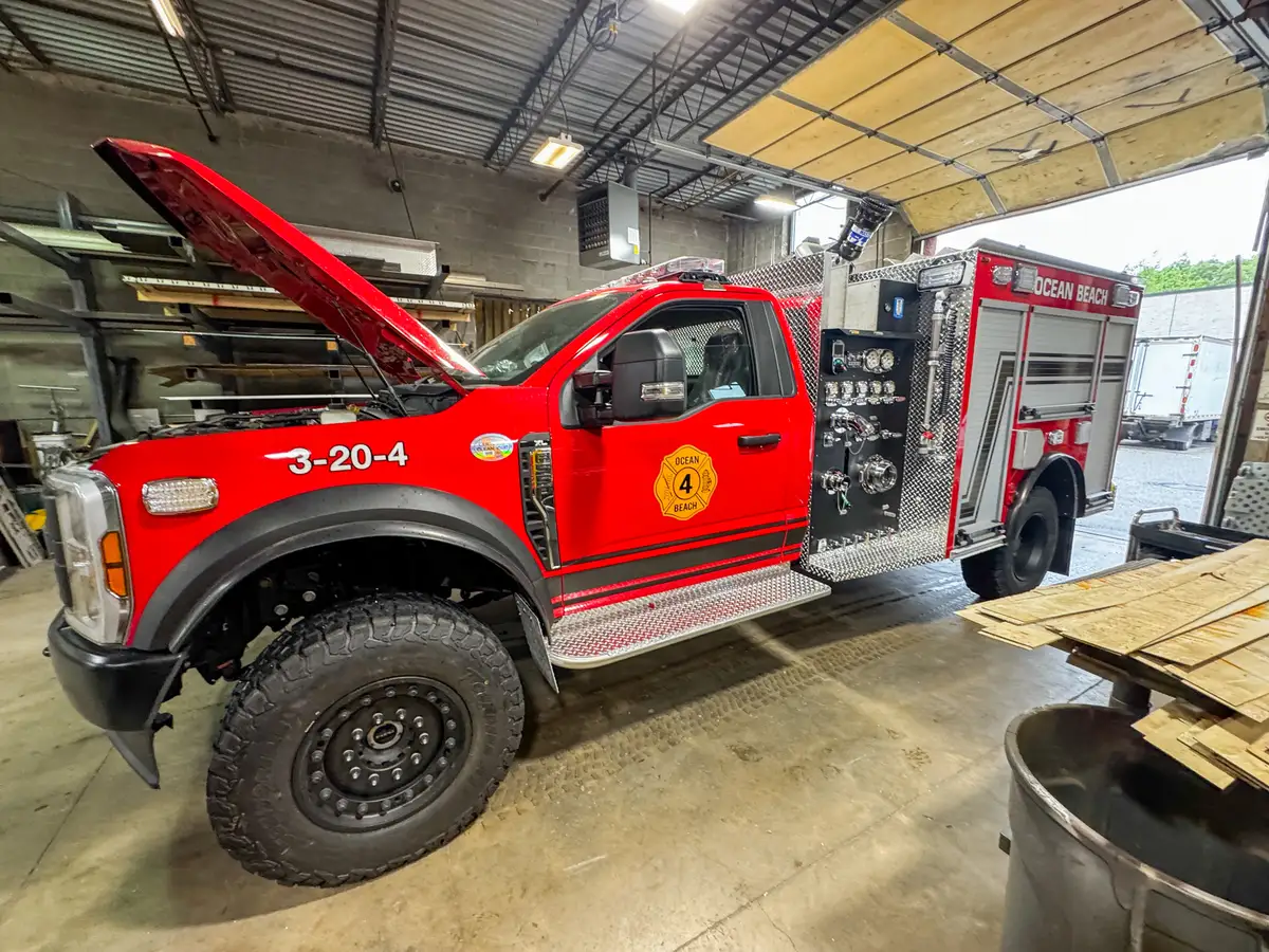 Body panels staged in production area, photo 68 of 179.