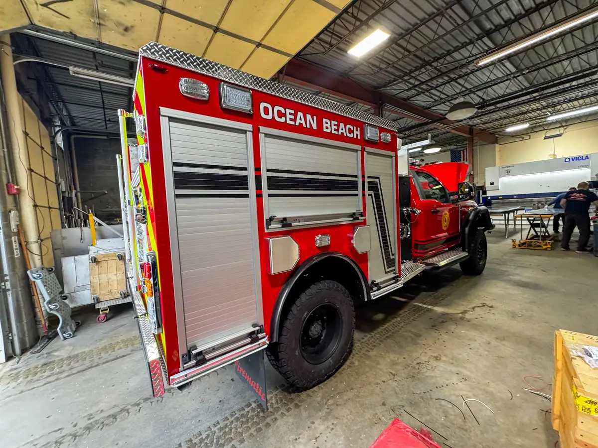 Side view of cab and body in assembly bay, photo 76 of 179.