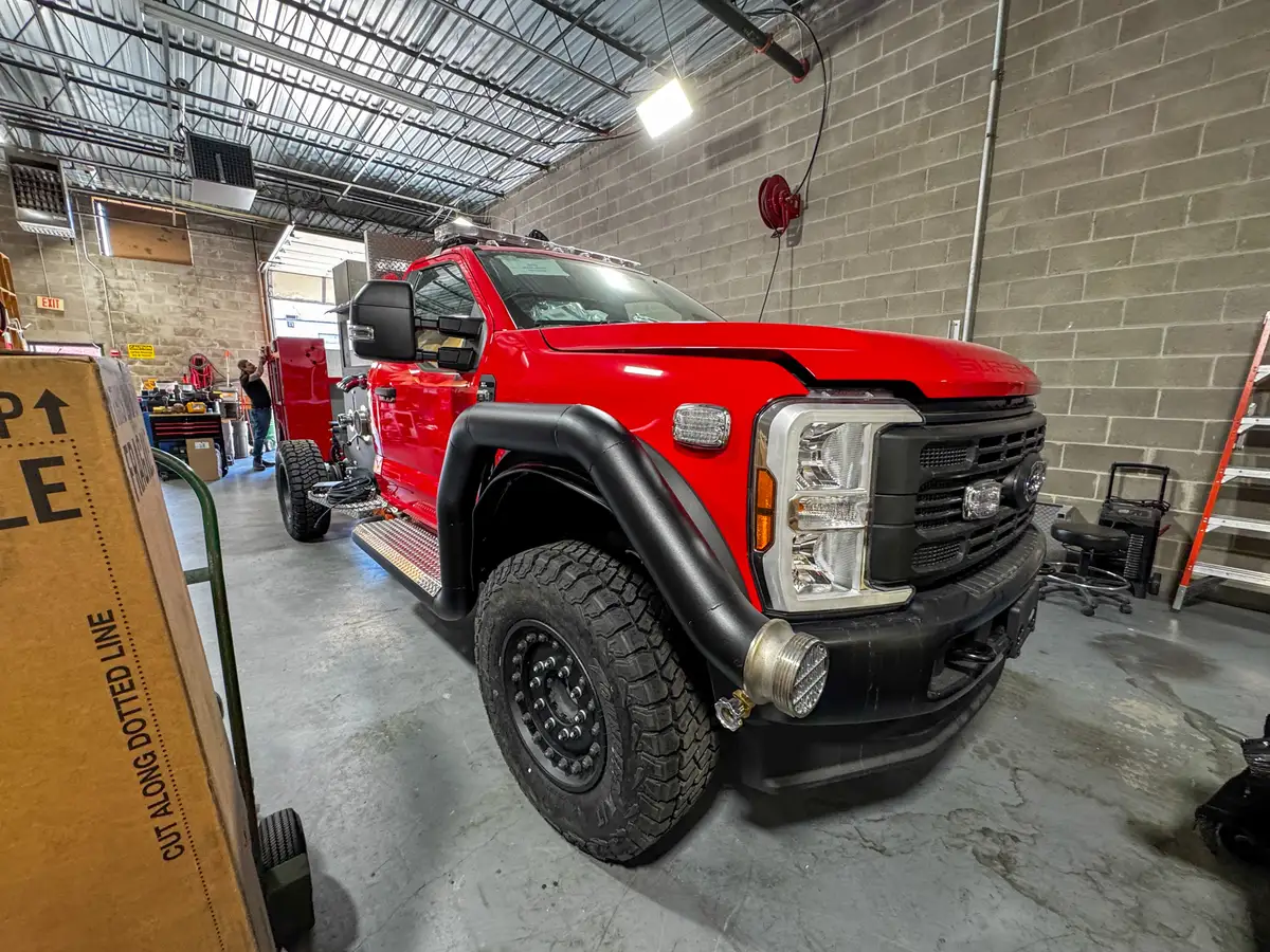 Cab interior during upfit with exposed wiring, photo 85 of 179.