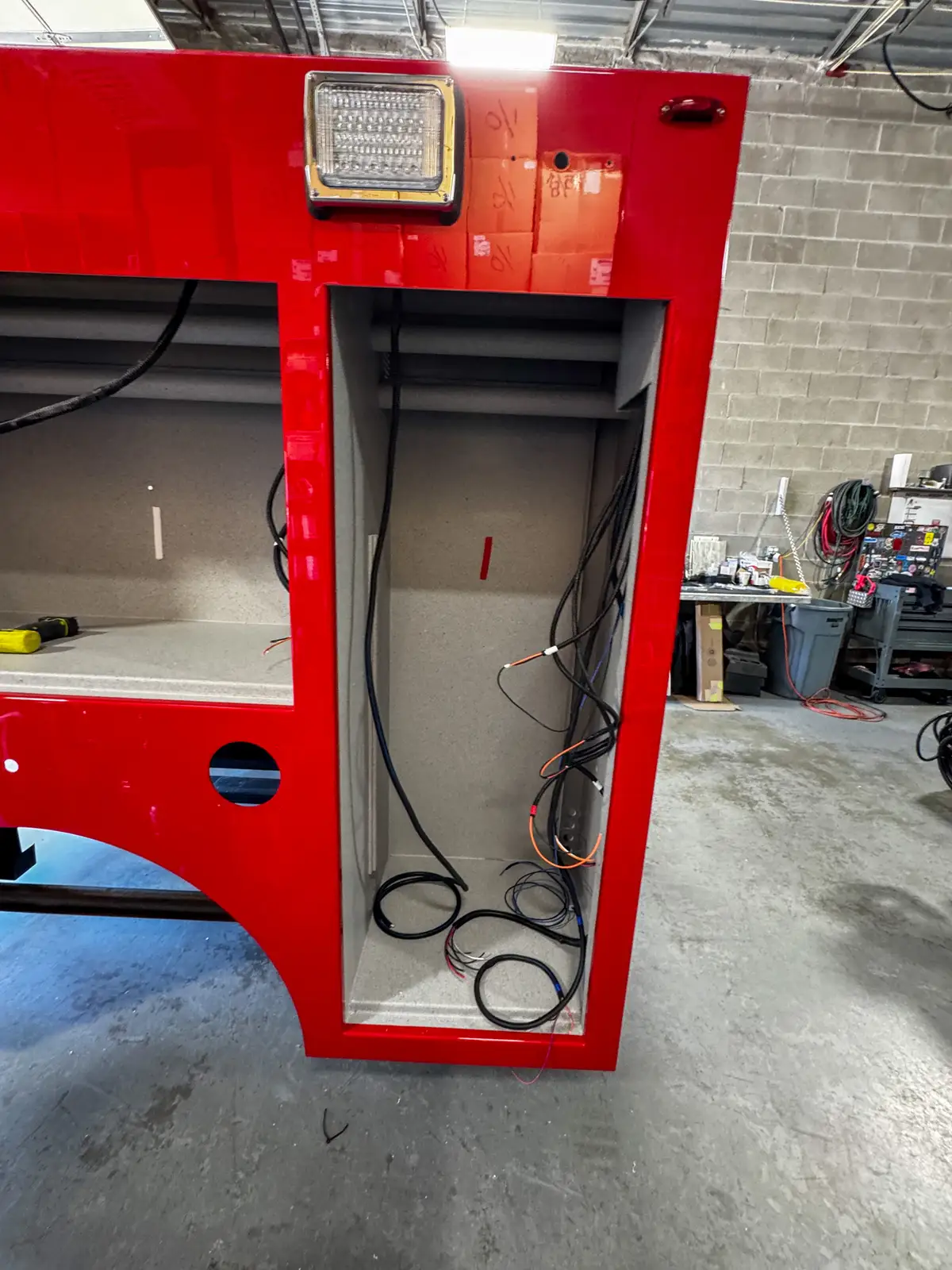 Pump plumbing and valves inside body compartment, photo 94 of 179.