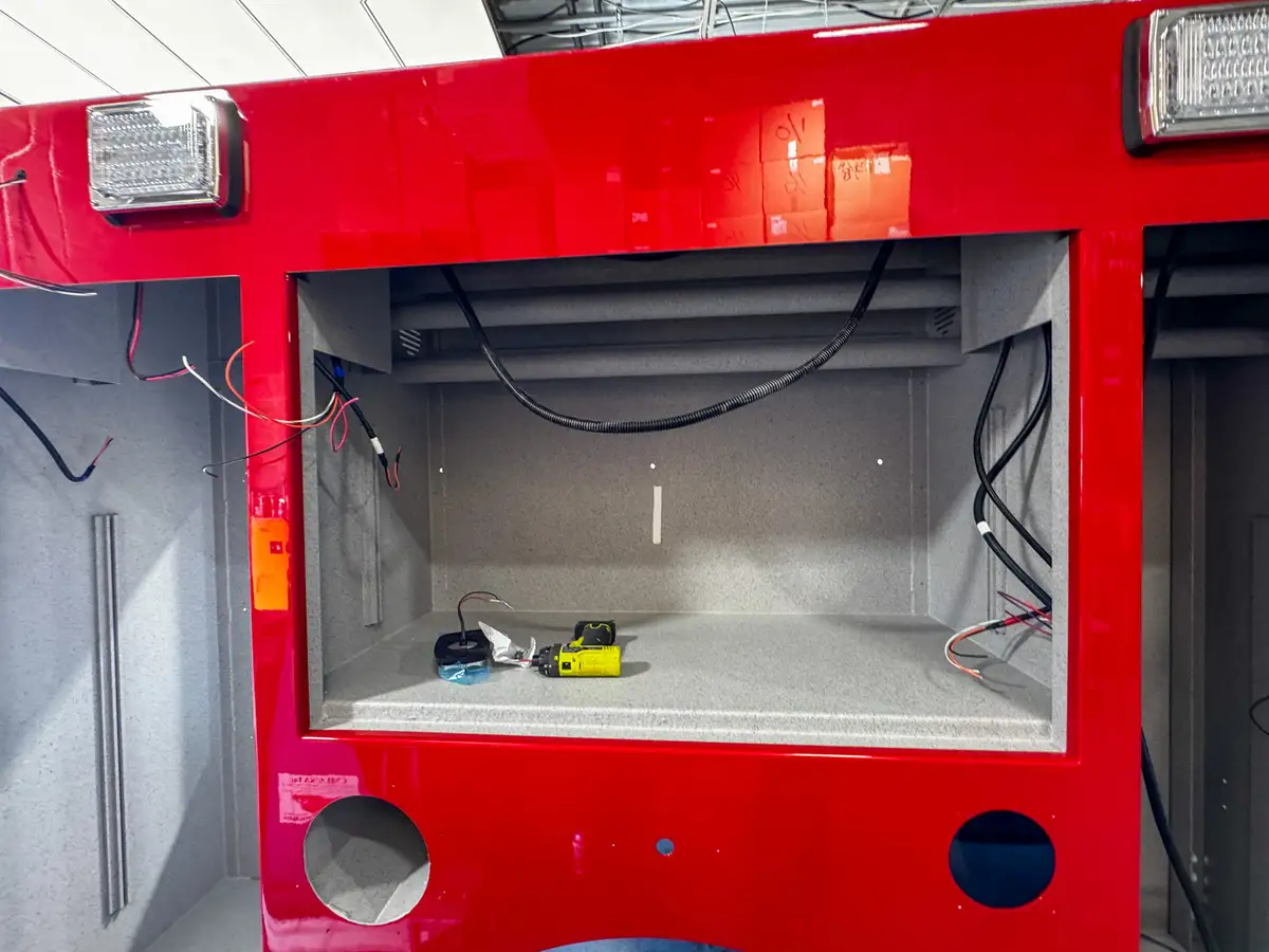 Cab interior during upfit with exposed wiring, photo 95 of 179.