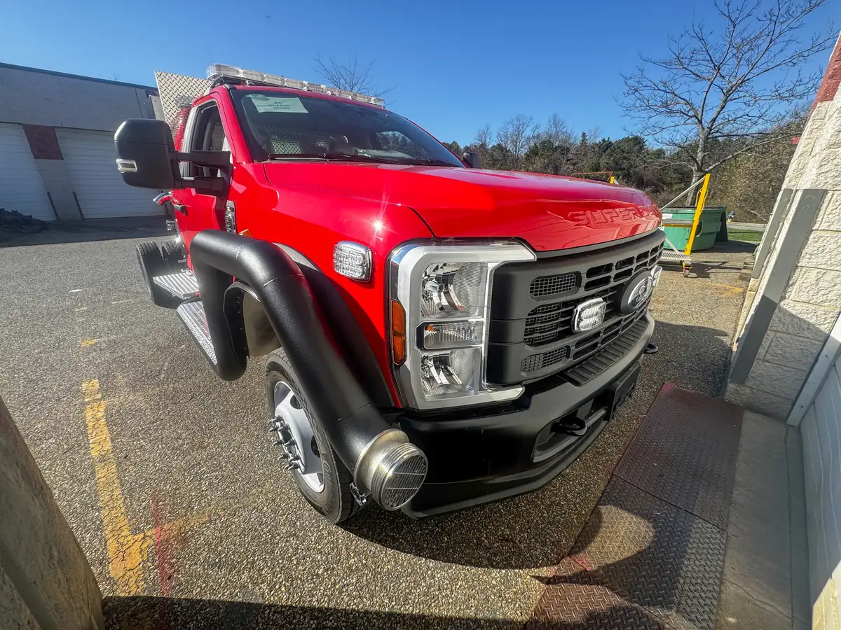 Body panels staged in production area, photo 98 of 179.