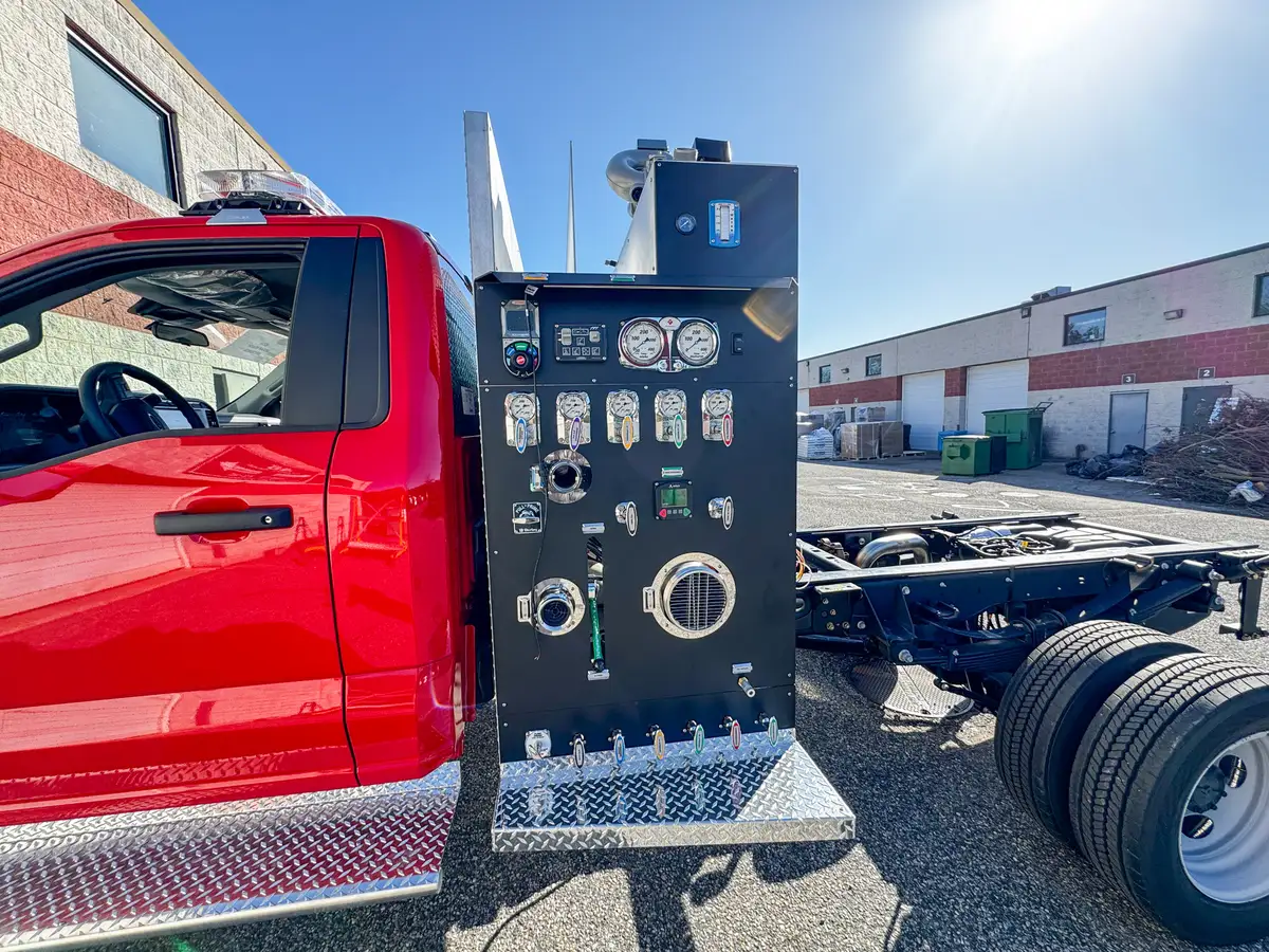 Side view of cab and body in assembly bay, photo 106 of 179.
