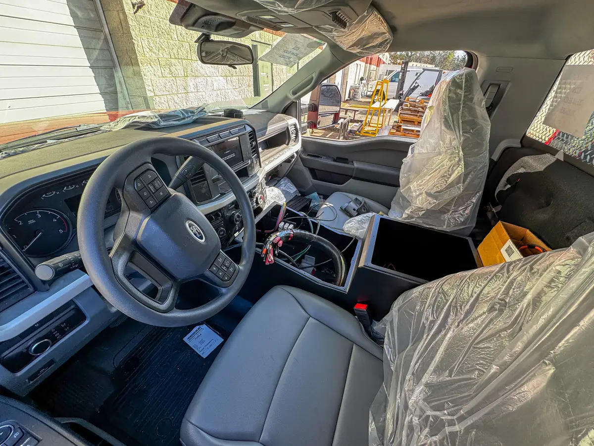 Body panels staged in production area, photo 108 of 179.