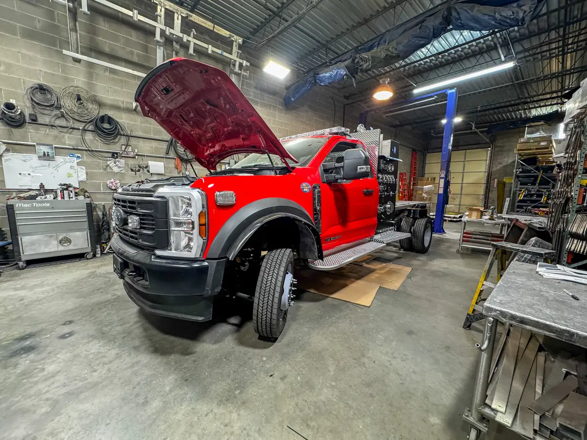Partially assembled apparatus body on shop floor, photo 110 of 179.