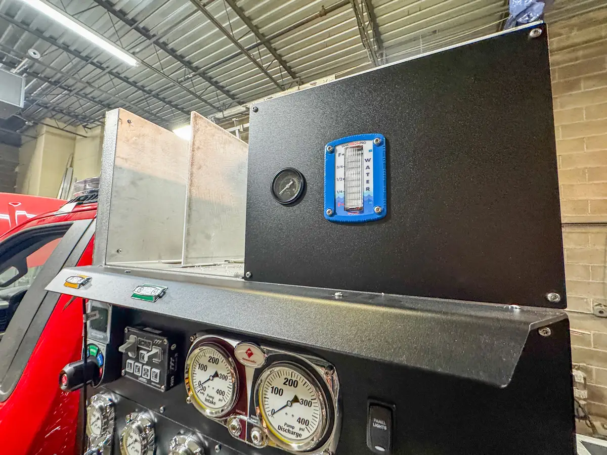 Side view of cab and body in assembly bay, photo 116 of 179.