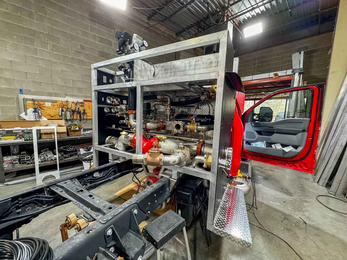 Body panels staged in production area, photo 148 of 179.